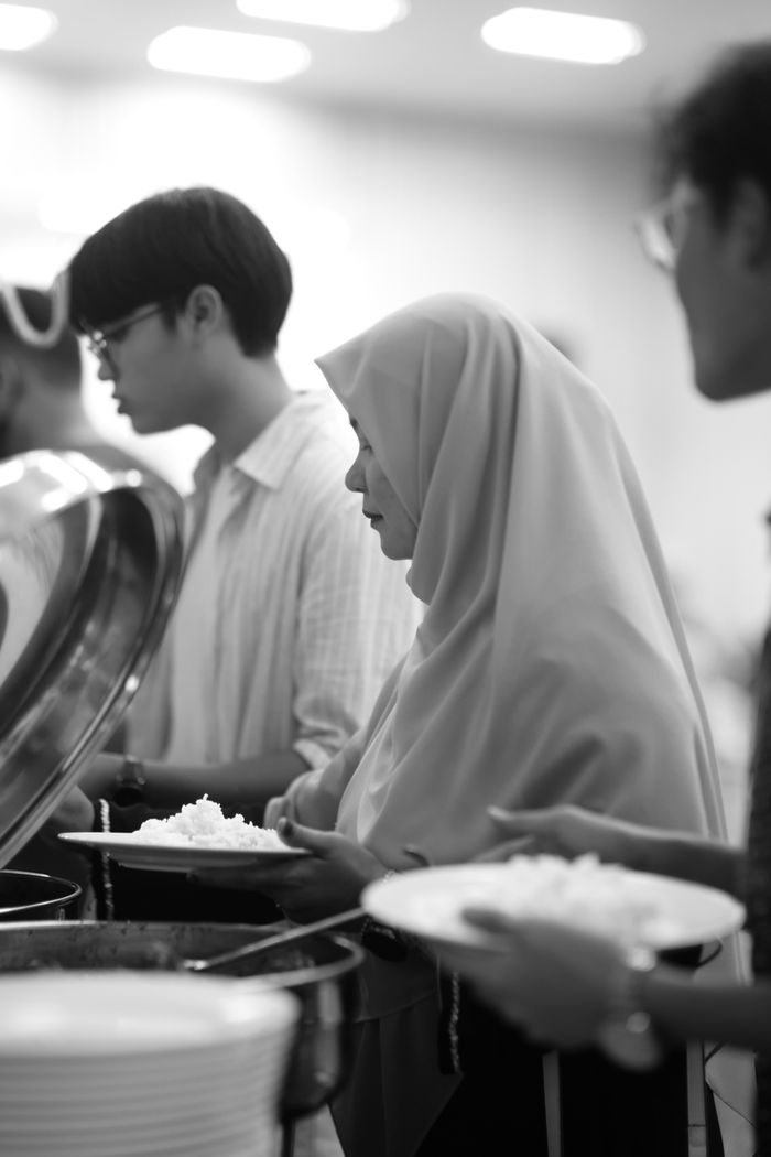 Services A group of people enjoying a meal in a restaurant in Shah Alam, Malaysia.